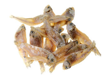 Dried anchovies over white background