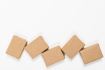 Boxes in craft paper on white background