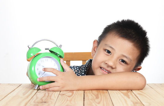 bright picture of asian kid with clock