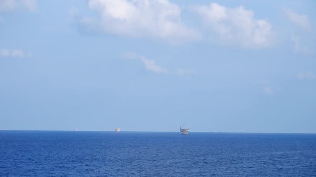 Small offshore platforms in the middle of the ocean 
