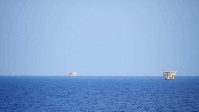 Small offshore platforms in the middle of the ocean 
