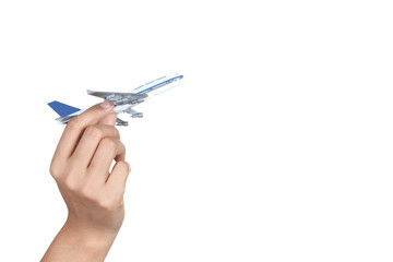 hand holding airplane isolated on white, travel concept