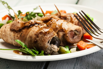 Pork rolls and vegetables