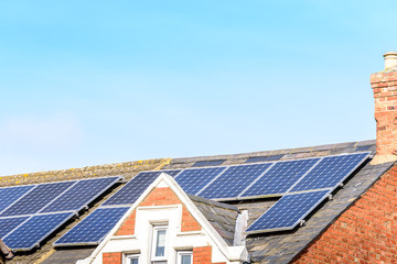 Fototapeta premium UK Solar Energy Panel on Sunny Roof