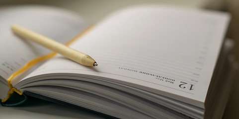 a notebook for taking notes pen pencil business office for the financial statements
