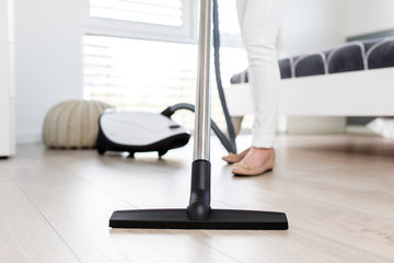 Attractive Female with Vacuum Cleaner