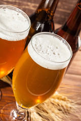 Glass of beer and beer bottle