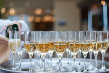 A pyramid of glasses with champagne