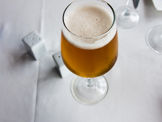 A glass of light beer in the restaurant
