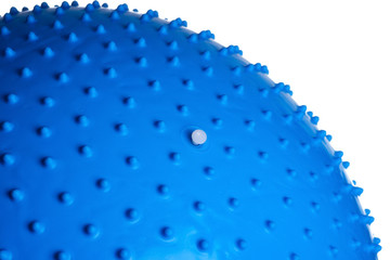 Close up of an blue fitness ball isolated on white background