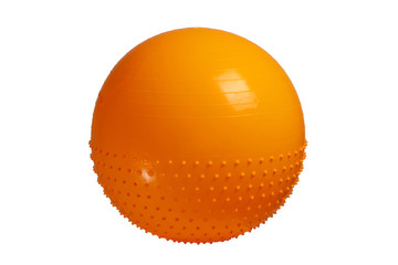 Obraz na płótnie Canvas Close up of an orange fitness ball isolated on white background