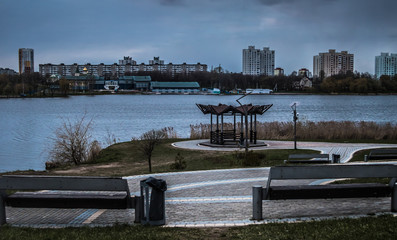 Bike path for cyclists. Bike lane in the park. Rest zone. Rest at the water
