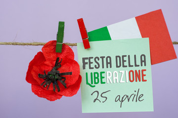 April 25 Liberation Day Text in italian card. Flower poppy and italy flag. selective focus image 