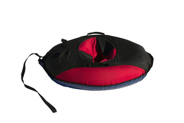 red and black material snow inner tubing (toobing) isolated on white background