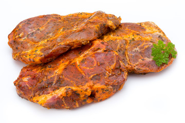 Pork chop, marinated. Isolated on the white background.