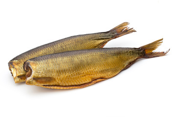 Smoked trout in front of a white background.