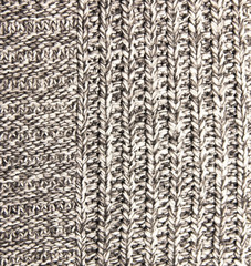 gray knitted wool knitted warm clothes for the winter fabric texture background
