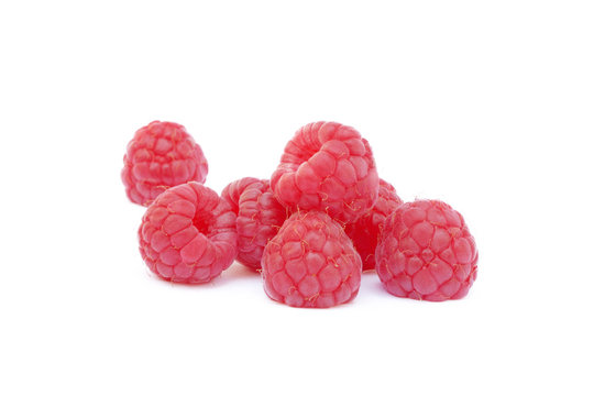Fresh ripe raspberries isolated on white background