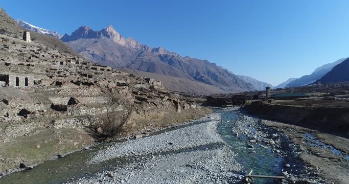 Flyover mountain river and ruined ancient city