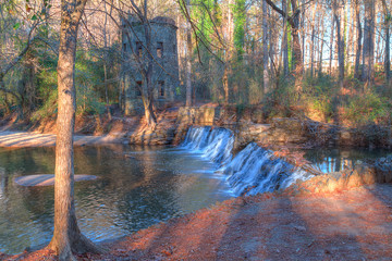 Spillway waterfall and the tower in the Lullwater Park, Atlanta, USA.