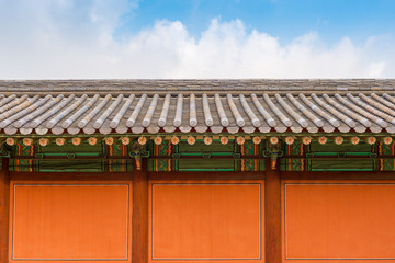 South Korea orange temple wall with blue sky and cloud