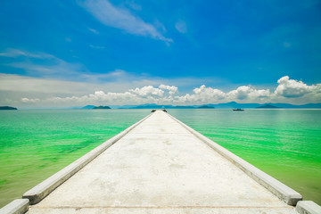 Fototapeta premium Cement way for walking to the beautiful beach