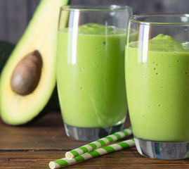 two fresh blended smoothies made with avocado
