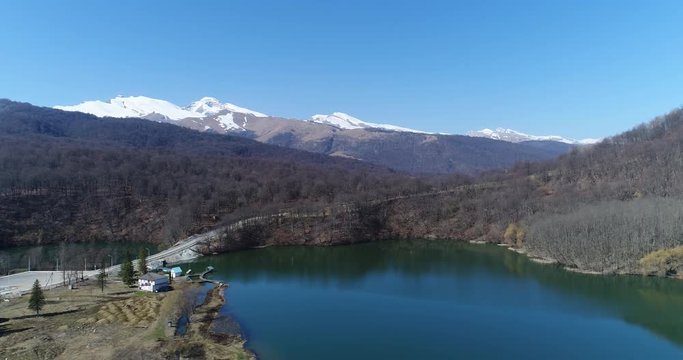 Aerial view of blue lake between mountains