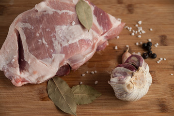 Washed chopped meat with pork shoulder on spice board