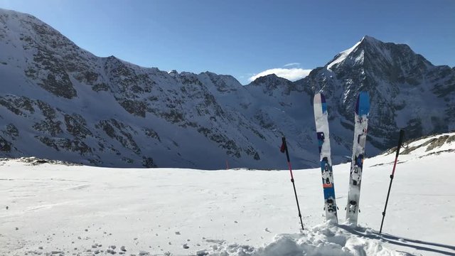 Ski against winter mountain range, Sulden, Solda Italy. Loop