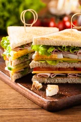 Papier Peint photo Snack Delicious toast sandwich with ham, cheese, egg and vegetables.