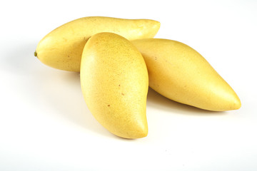 Yellow mango  on a white  background
