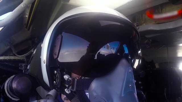 The pilot in the helmet. Refueling