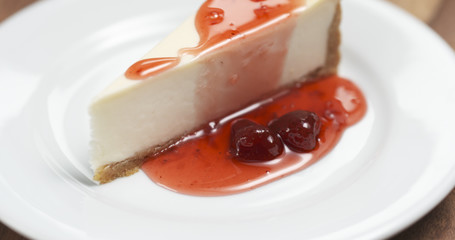 strawberry jam over traditional new york cheesecake, 4k photo
