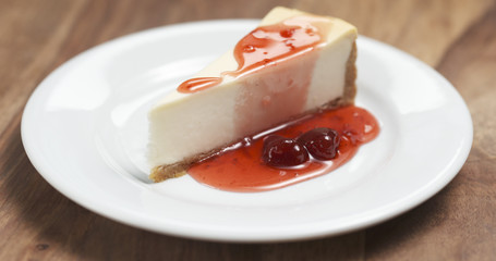 strawberry jam over traditional new york cheesecake, 4k photo