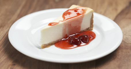 strawberry jam pour over traditional new york cheesecake, 4k photo