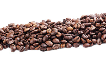 Roasted coffee beans on a white background