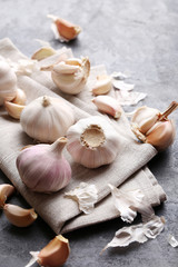 Garlic on the grey wooden table