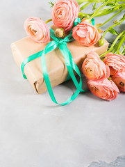 Beautiful Pink ranunculus flowers bouquet and gift box. Valentine mother day. Wedding birthday present