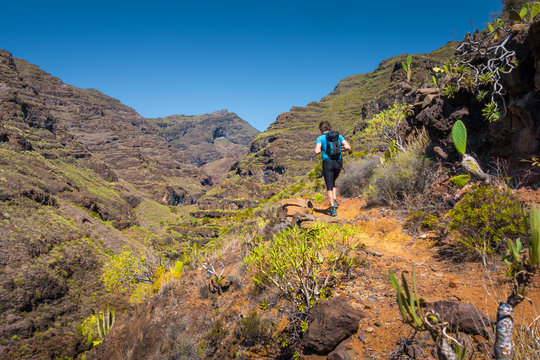 Hiker on a trail in the Canary Islands, Spain