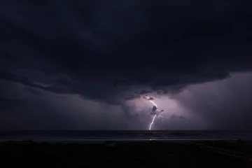 Photo sur Plexiglas Ciel Lightning and the Ocean