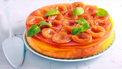 Apricot jelly topping cheesecake served