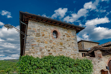 Panorama of green chianti hills in tuscany italy in spring, land of red wine and cypresses