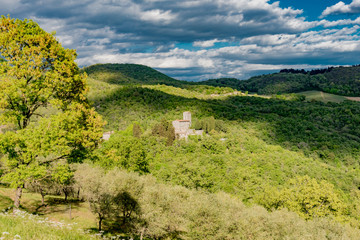 Panorama of green chianti hills in tuscany italy in spring, land of red wine and cypresses