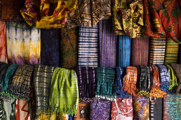 Shop of colorful canvases and scarves in Gambia