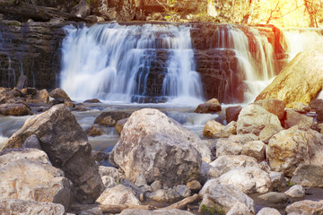 Fototapeta premium beautiful waterfalls and green forest at susnet