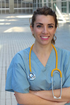 Healthcare professional with arms crossed - Stock image
