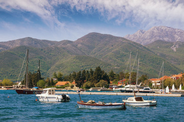Fototapeta na wymiar Montenegro, Bay of Kotor. View of Seljanovo village (near Tivat city) from the sea