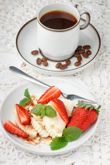 Healthy Breakfast.  cheese with granola, strawberries, mint and syrup. Selective focus
