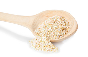 bran in wooden spoon